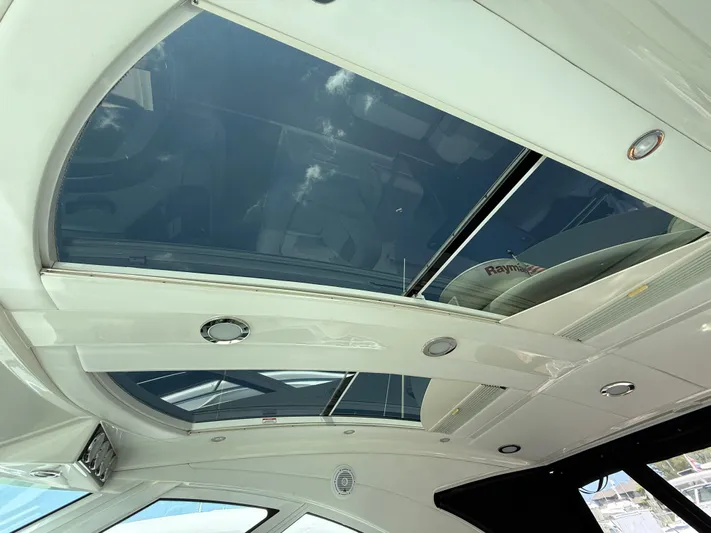 Midnight Run Yacht Photos Pics 2009 Sea Ray 43 Sundancer yacht with sleek glass sunroof and modern interior design.