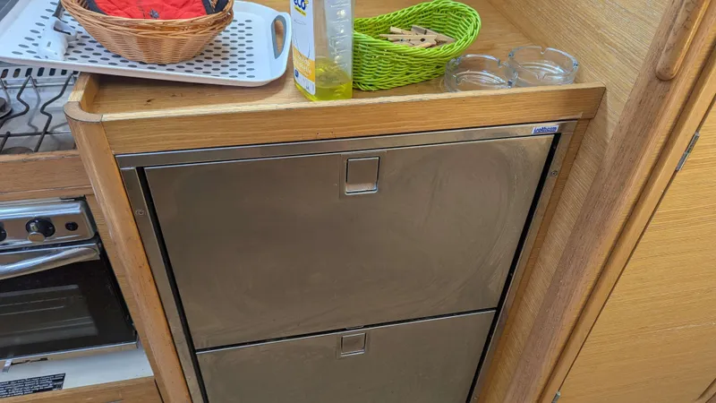 Nevis Yacht Photos Pics Galley area of 2017 Dufour 460 Grand Large yacht with storage and kitchen items.