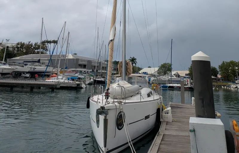 Nevis Yacht Photos Pics 2017 Dufour 460 Grand Large sailboat docked at marina under cloudy sky.