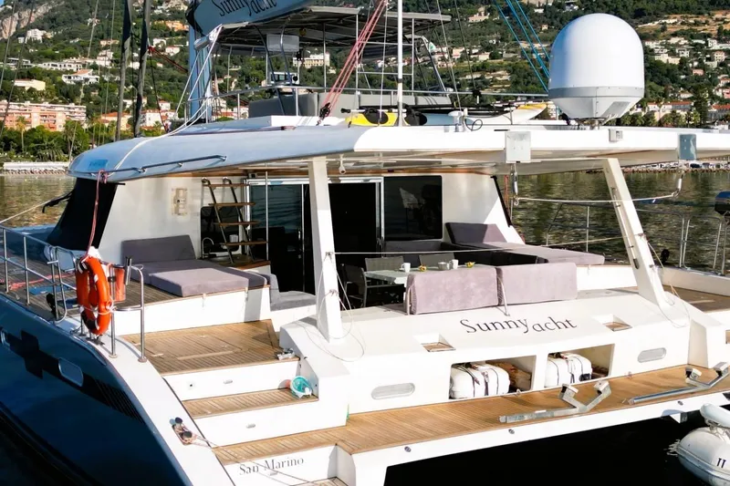 Sunnyacht Yacht Photos Pics Luxurious 2008 Sunreef 62 yacht with spacious deck and elegant seating area.