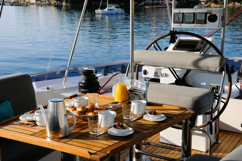 Sunnyacht Yacht Photos Pics Breakfast setup on 2008 Sunreef 62 yacht with pastries and orange juice.
