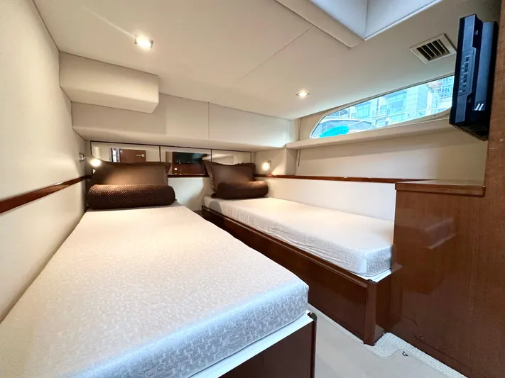  Yacht Photos Pics 2012 Sea Ray 450 Sedan Bridge cabin with twin beds and modern interior design.
