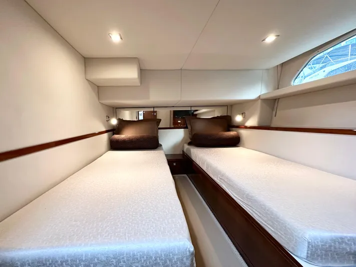 Yacht Photos Pics 2012 Sea Ray 450 Sedan Bridge cabin with twin beds and modern interior design.