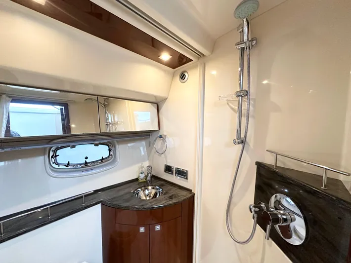  Yacht Photos Pics Luxurious bathroom in 2012 Sea Ray 450 Sedan Bridge yacht with modern fixtures.