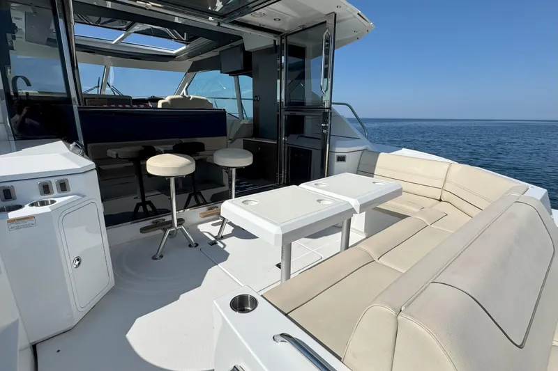  Yacht Photos Pics Luxurious 2017 Cruisers Yachts 45 Cantius interior with seating and ocean view.