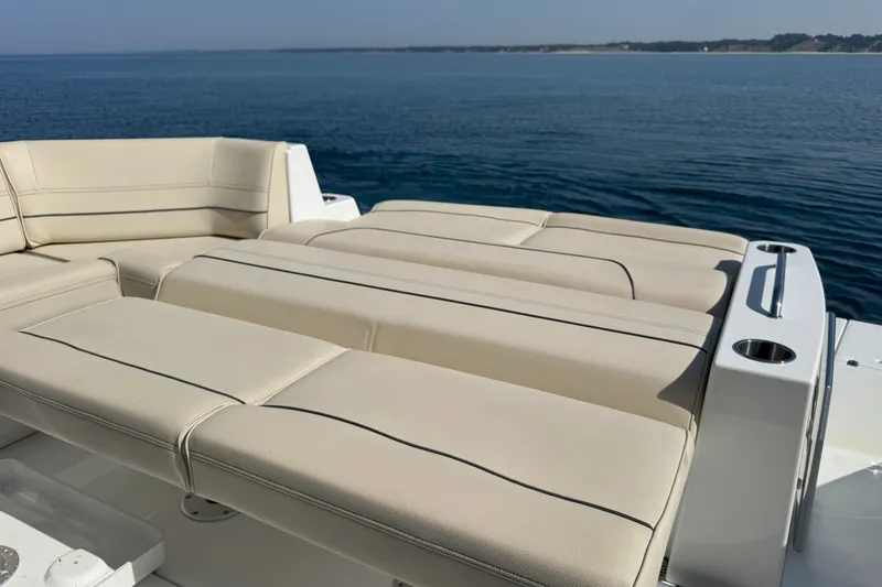  Yacht Photos Pics Luxurious seating on 2017 Cruisers Yachts 45 Cantius, overlooking serene ocean waters.