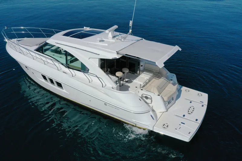  Yacht Photos Pics 2017 Cruisers Yachts 45 Cantius on calm water, showcasing sleek design and spacious deck.