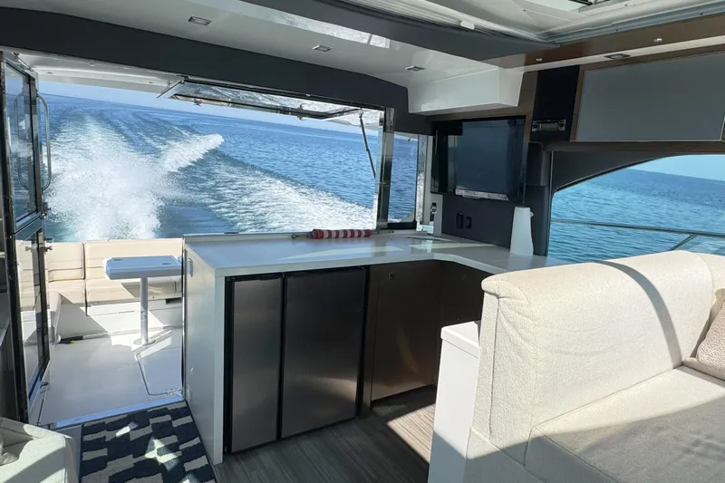  Yacht Photos Pics Interior of 2017 Cruisers Yachts 45 Cantius with ocean view and modern amenities.