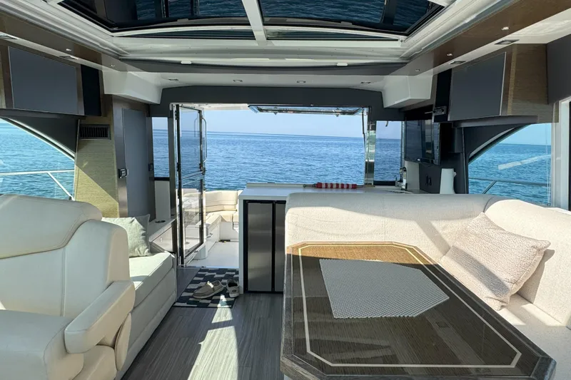  Yacht Photos Pics Luxurious interior of 2017 Cruisers Yachts 45 Cantius with ocean view.