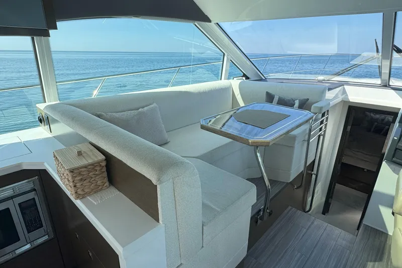  Yacht Photos Pics Luxurious interior of 2017 Cruisers Yachts 45 Cantius with ocean view.