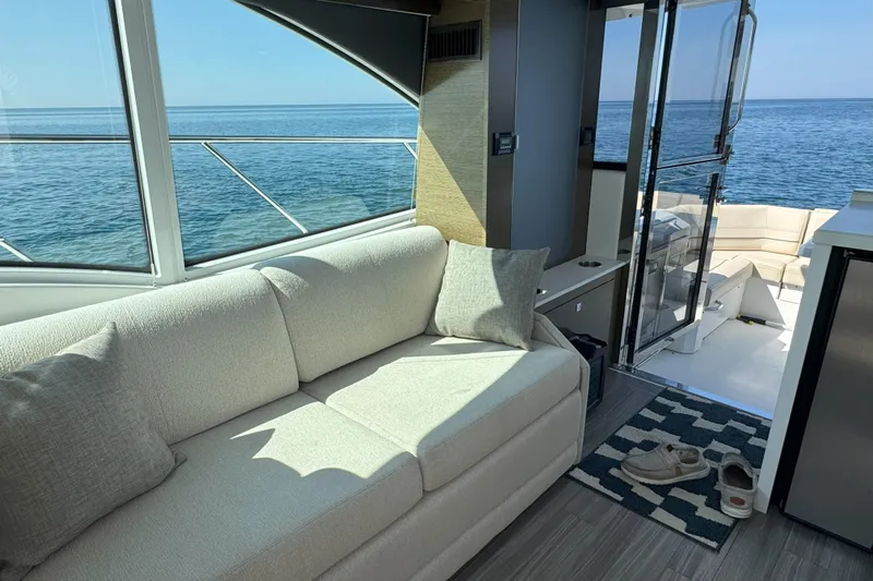  Yacht Photos Pics Luxurious interior of 2017 Cruisers Yachts 45 Cantius with ocean view.