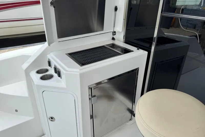  Yacht Photos Pics 2017 Cruisers Yachts 45 Cantius outdoor kitchen with grill and storage.