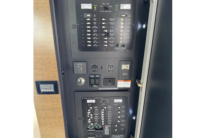  Yacht Photos Pics Electrical control panel of 2017 Cruisers Yachts 45 Cantius, featuring switches and gauges.