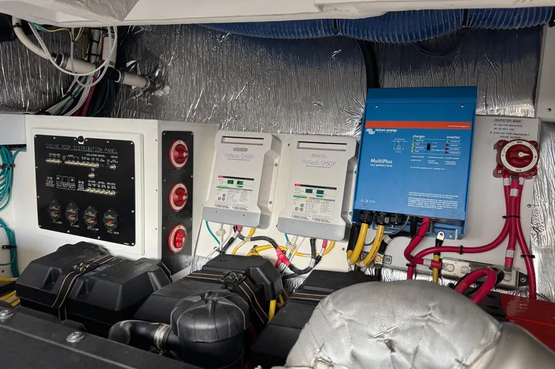  Yacht Photos Pics Engine room of 2017 Cruisers Yachts 45 Cantius with electrical panels and wiring.