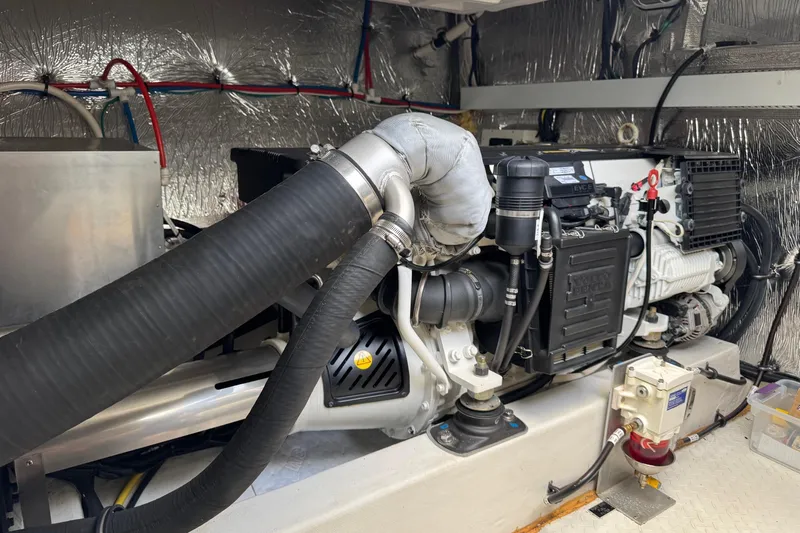  Yacht Photos Pics Engine room of 2017 Cruisers Yachts 45 Cantius with visible machinery and components.