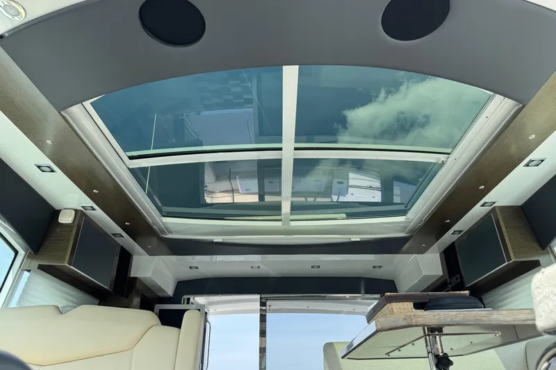  Yacht Photos Pics Interior view of 2017 Cruisers Yachts 45 Cantius with panoramic sunroof.