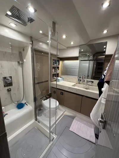  Yacht Photos Pics Luxurious bathroom in 2017 Prestige 680 yacht with modern shower and sleek design.