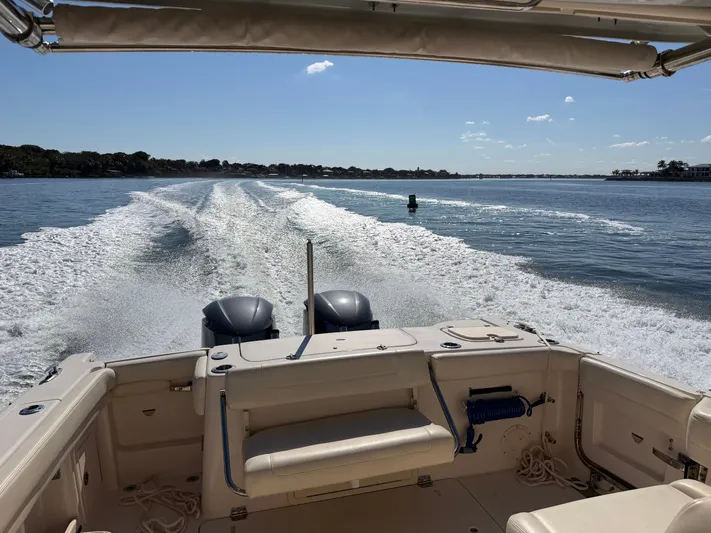  Yacht Photos Pics Grady-White Freedom 307 boat on calm waters, 2021 model.