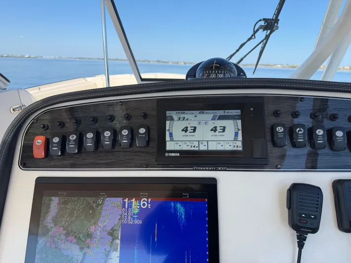  Yacht Photos Pics Dashboard of Grady-White Freedom 307 boat, 2021 model.