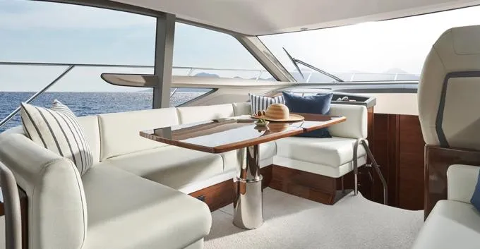  Yacht Photos Pics Luxurious interior of 2024 Princess F50 yacht with elegant seating and ocean view.