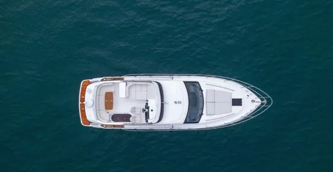  Yacht Photos Pics Aerial view of 2024 Princess F50 yacht on blue water.