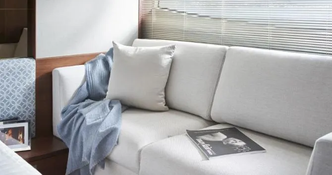  Yacht Photos Pics Luxurious interior of 2024 Princess F50 yacht with elegant sofa and decor.