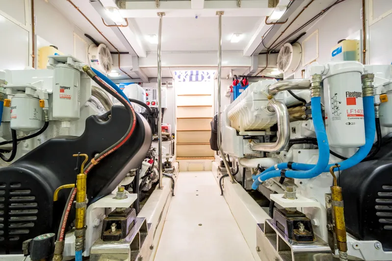  Yacht Photos Pics Engine room of 2026 Alaska 59 Sedan, showcasing dual engines and mechanical components.