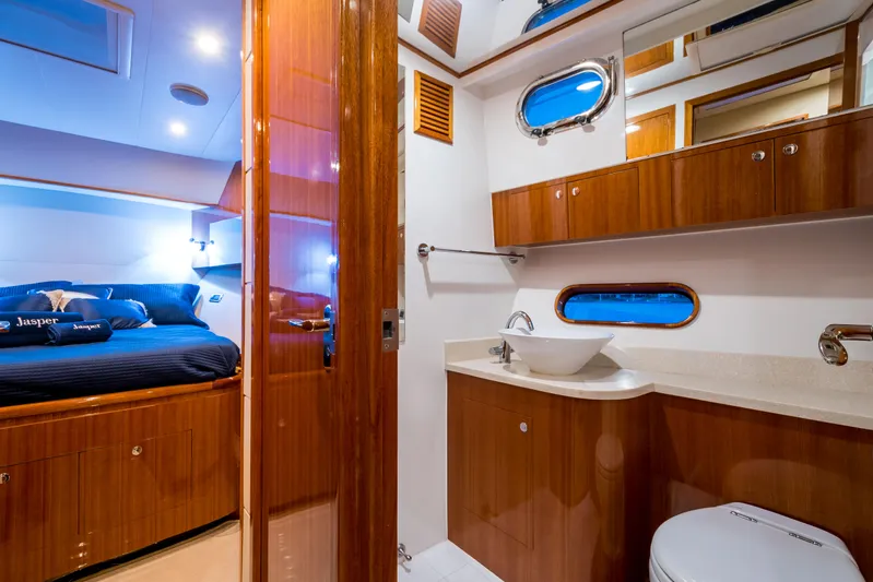  Yacht Photos Pics Luxurious interior of 2026 Alaska 59 Sedan yacht with bedroom and bathroom.