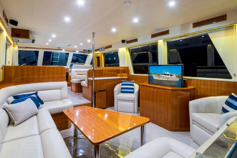  Yacht Photos Pics Luxurious interior of 2026 Alaska 59 Sedan yacht with elegant seating and modern amenities.
