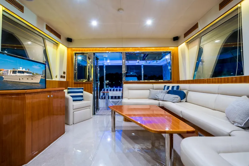  Yacht Photos Pics Luxurious interior of 2026 Alaska 59 Sedan yacht with modern furnishings and ambient lighting.