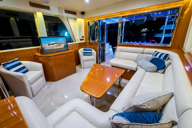  Yacht Photos Pics Luxurious interior of 2026 Alaska 59 Sedan yacht with plush seating and modern decor.