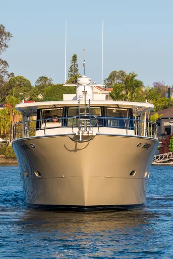  Yacht Photos Pics Front view of 2026 Alaska 59 Sedan yacht on a sunny day.
