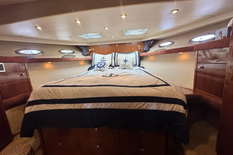  Yacht Photos Pics Luxurious cabin interior of 2006 Meridian 490 Pilothouse yacht with nautical decor.