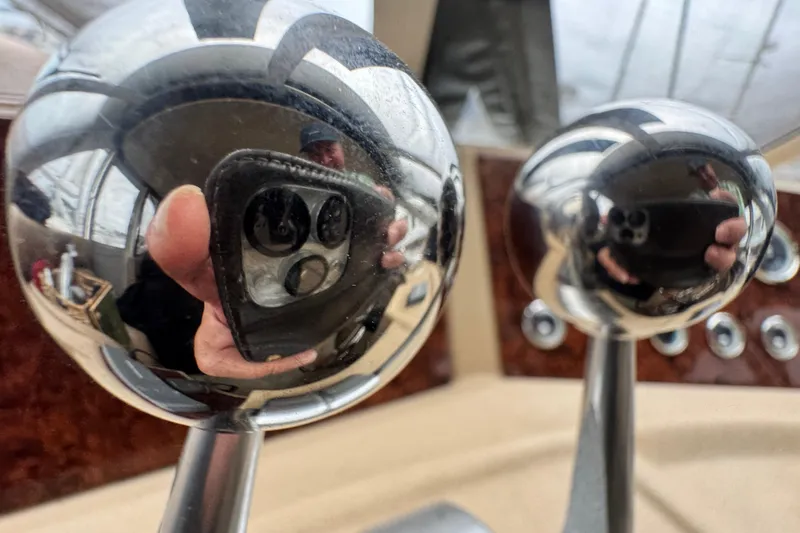  Yacht Photos Pics Close-up of reflective controls on a 2006 Meridian 490 Pilothouse yacht.