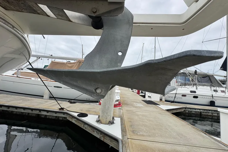  Yacht Photos Pics Anchor of 2006 Meridian 490 Pilothouse yacht at marina dock.