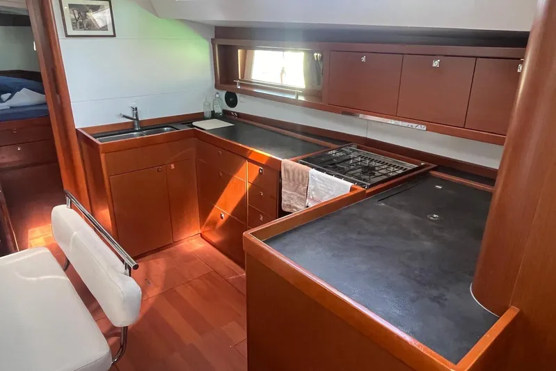 Marylin Yacht Photos Pics Luxurious 2018 Beneteau Oceanis 48 yacht interior kitchen with modern amenities.
