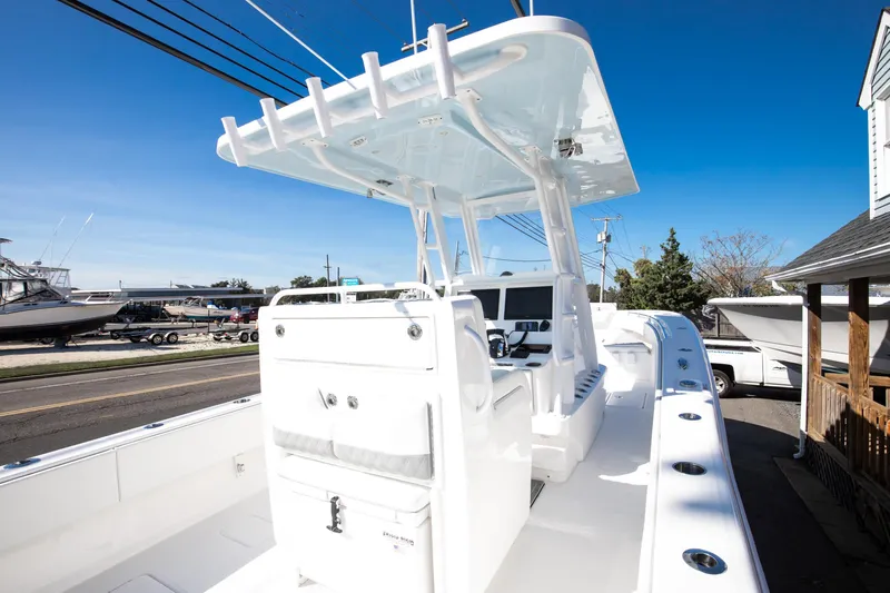  Yacht Photos Pics 2023 Invincible 33 Open Fisherman boat with center console and T-top.