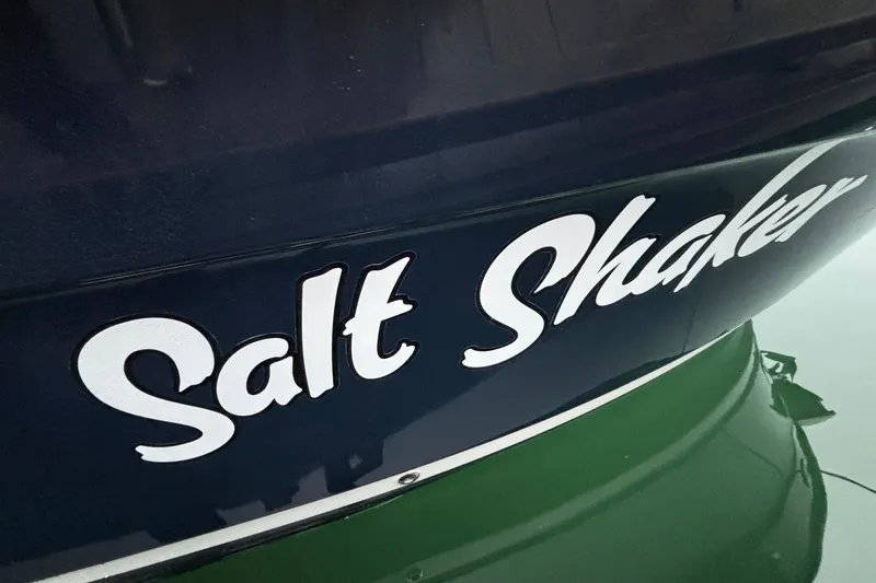 "salt Shaker" Yacht Photos Pics 2013 Cutwater C-28 boat named "Salt Shaker" with navy and green hull.