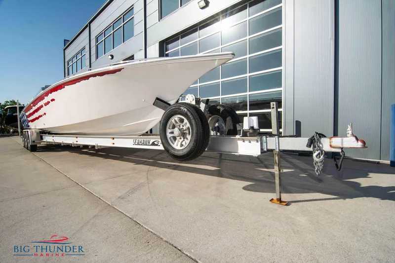  Yacht Photos Pics 2005 Fountain 42 Executioner speedboat on trailer outside Big Thunder Marine.