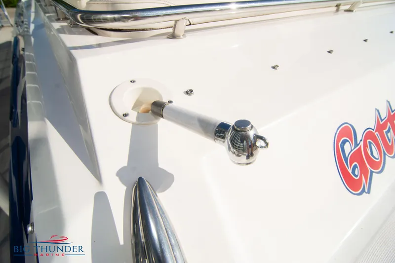  Yacht Photos Pics Close-up of a 2005 Fountain 42 Executioner boat's deck with a stainless steel fitting.