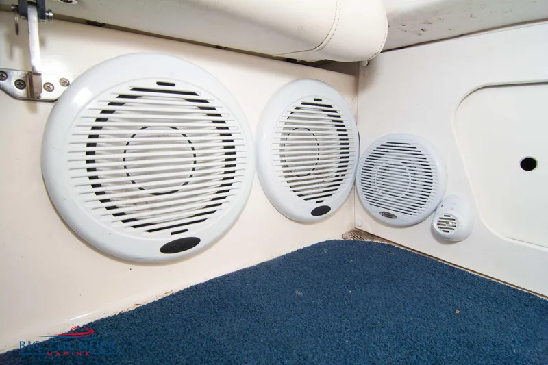  Yacht Photos Pics 2005 Fountain 42 Executioner boat interior speakers on blue carpet.