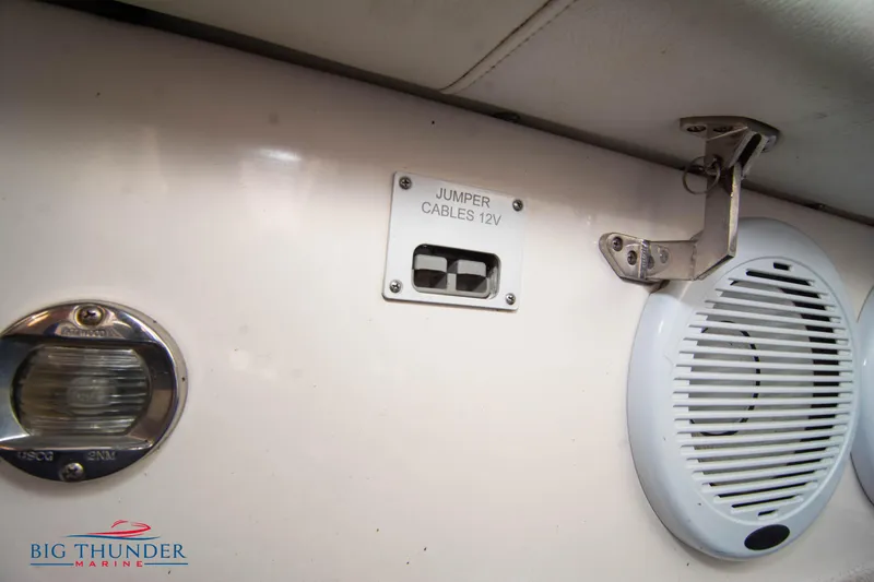  Yacht Photos Pics 2005 Fountain 42 Executioner boat interior with 12V jumper cable port and speaker.