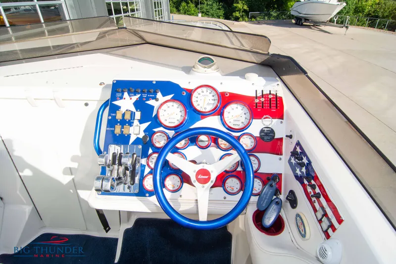 Yacht Photos Pics 2005 Fountain 42 Executioner boat dashboard with patriotic theme.
