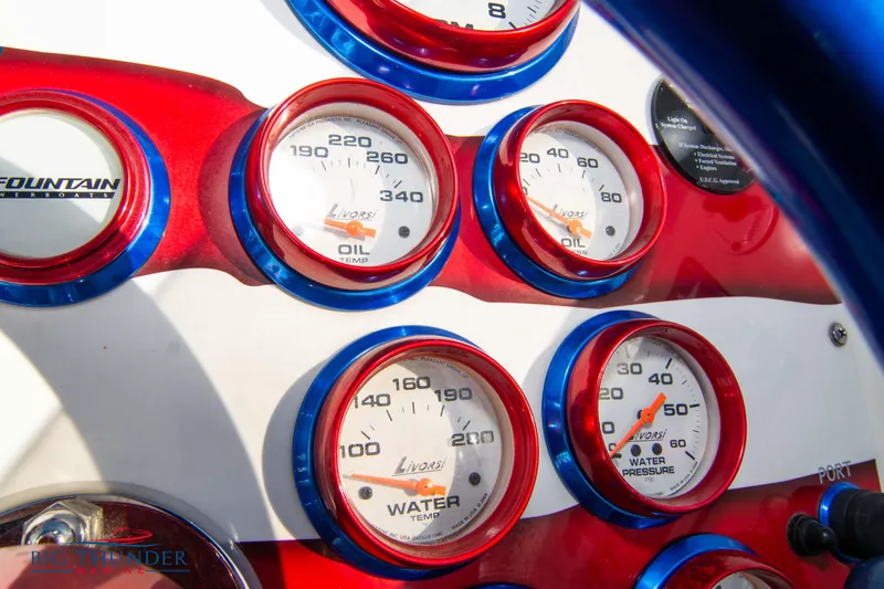  Yacht Photos Pics Close-up of 2005 Fountain 42 Executioner boat dashboard gauges.