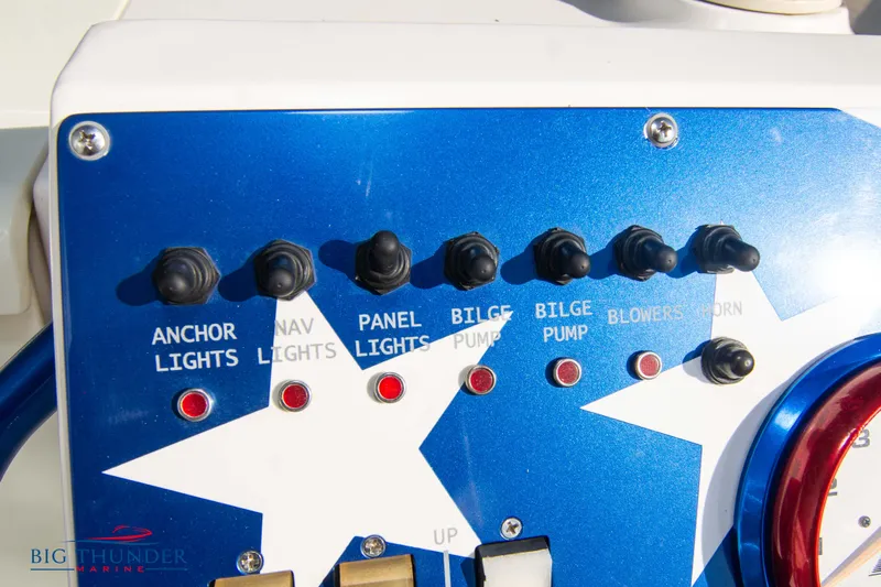  Yacht Photos Pics Control panel of a 2005 Fountain 42 Executioner boat with various switches.