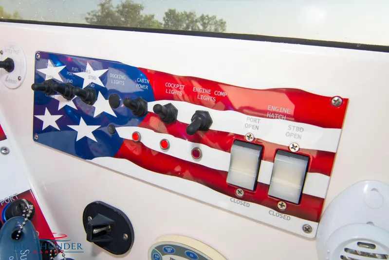  Yacht Photos Pics Control panel of a 2005 Fountain 42 Executioner boat with American flag design.