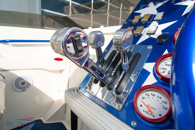  Yacht Photos Pics Close-up of 2005 Fountain 42 Executioner boat controls and gauges.