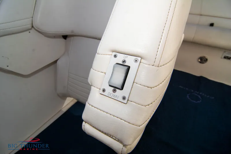  Yacht Photos Pics Close-up of 2005 Fountain 42 Executioner boat seat with adjustment switch.