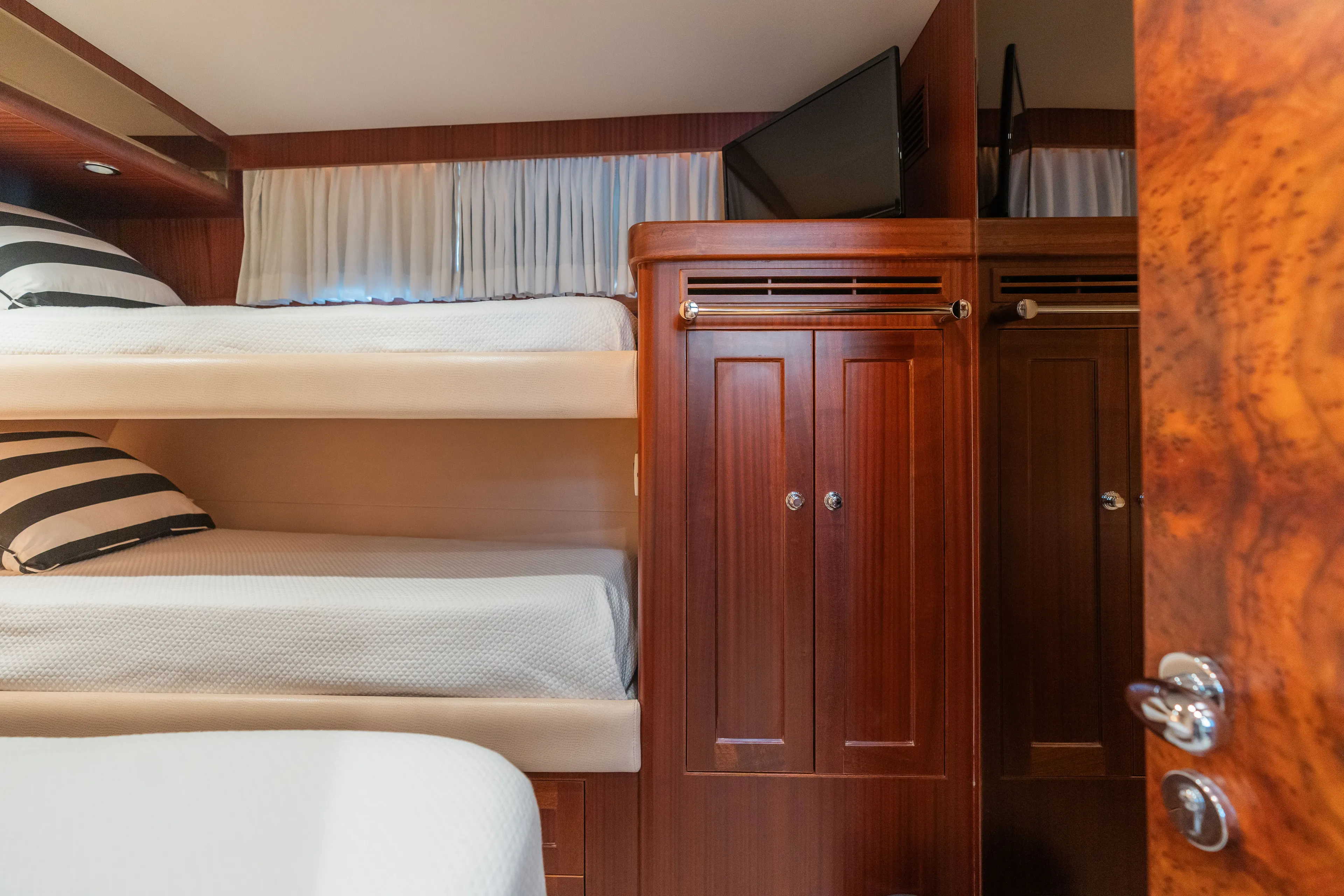  Yacht Photos Pics Interior of 2013 Ocean Alexander 65 Pilothouse yacht with bunk beds.