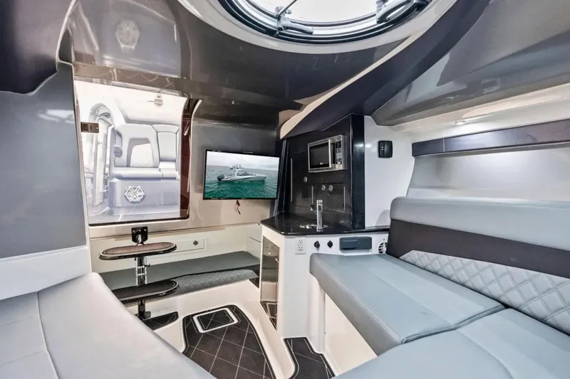  Yacht Photos Pics Luxurious interior of 2027 Deep Impact 399 Fwd Cabin boat with modern amenities.